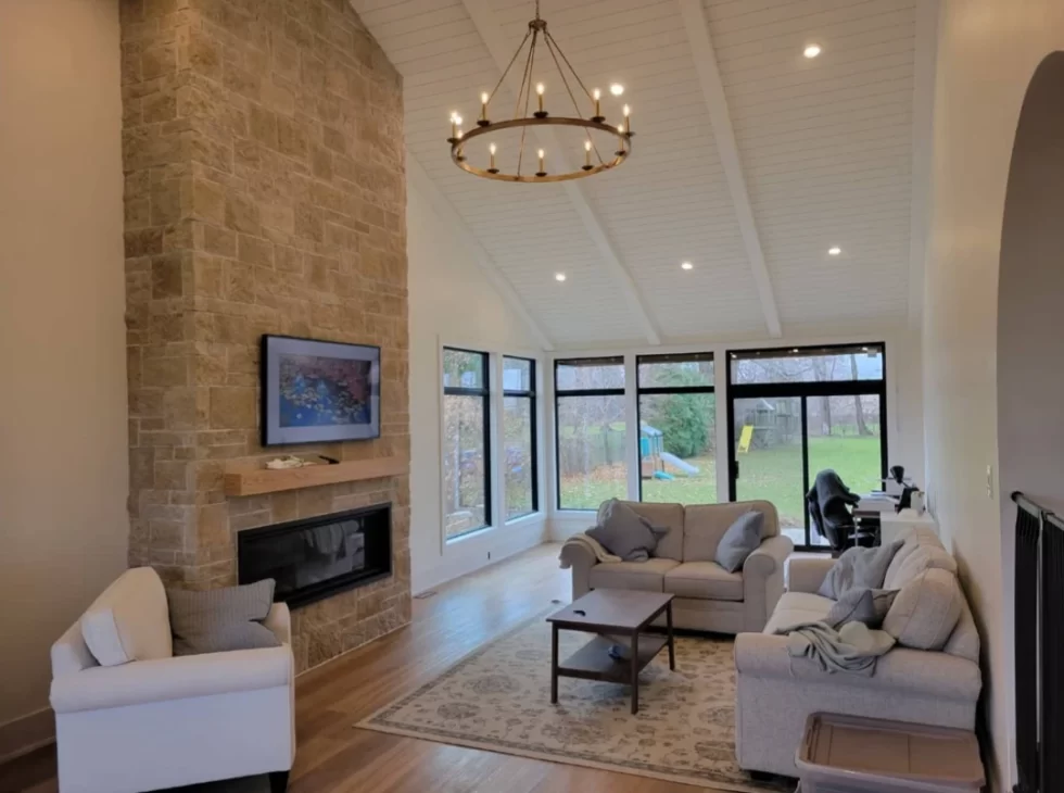 Modern high ceiling living room renovation by BWB Construction in Hamilton, Ontario