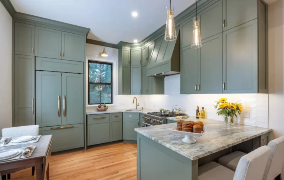 Modern green kitchen renovation by BWB Construction in Hamilton, Ontario